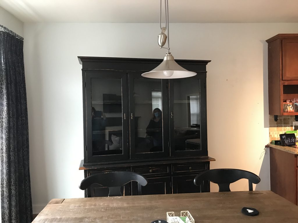 Black hutch with glass doors