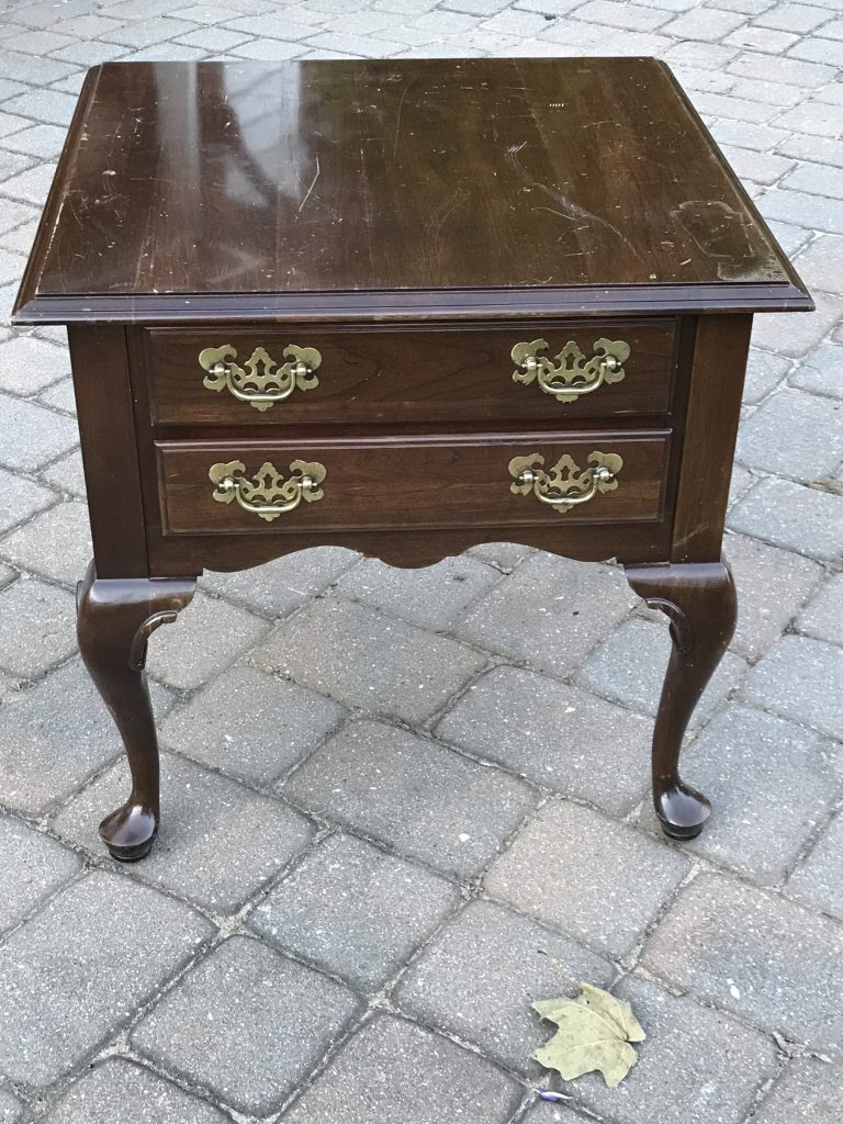 Formal, traditional end table, before