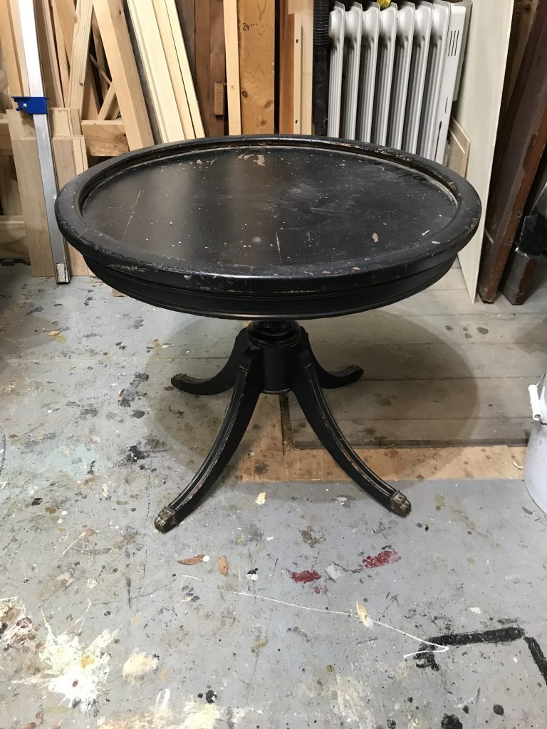 Round side table before