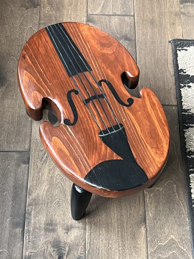 Stool with violin design